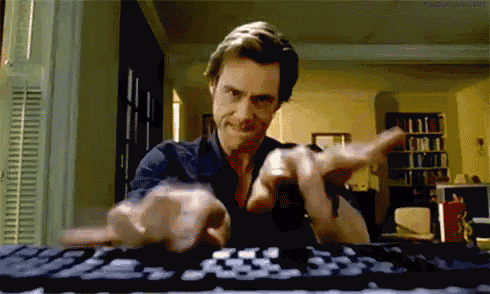 gif do ator Jim Carey digitando rapidamente em um teclado de computador